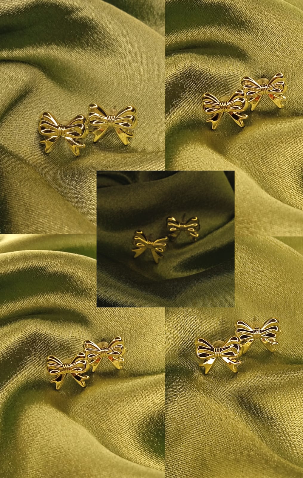 Gold bow-shaped stud earrings arranged on olive-green satin fabric. Decorative jewelry display.
